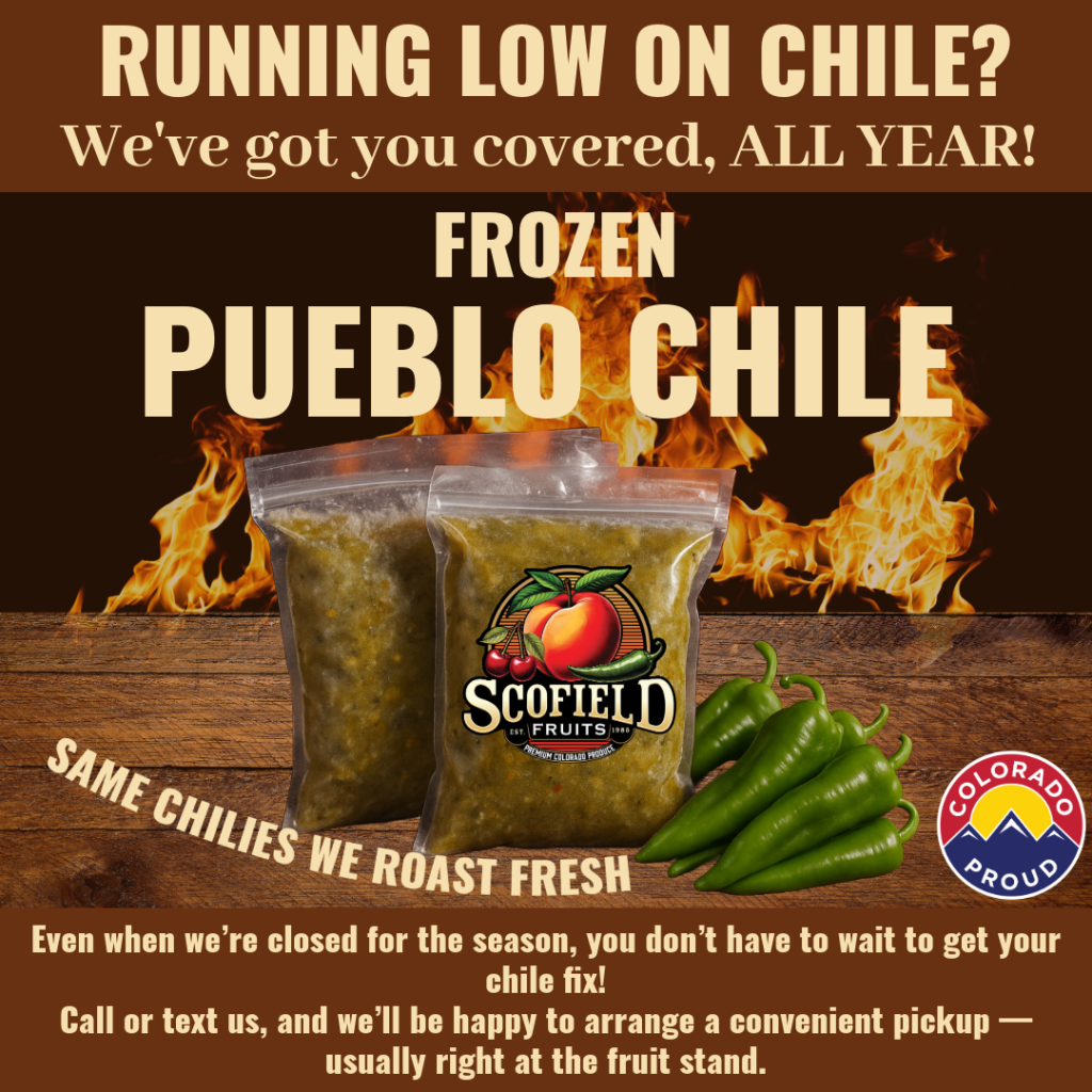 Bags of frozen Pueblo green chile from Scofield Fruits in front of flames, with fresh green chiles and Colorado Proud logo. Loveland, CO