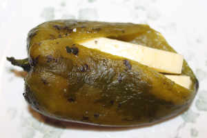 Fire roasted Poblano pepper stuffed with Asadero cheese. Loveland, CO